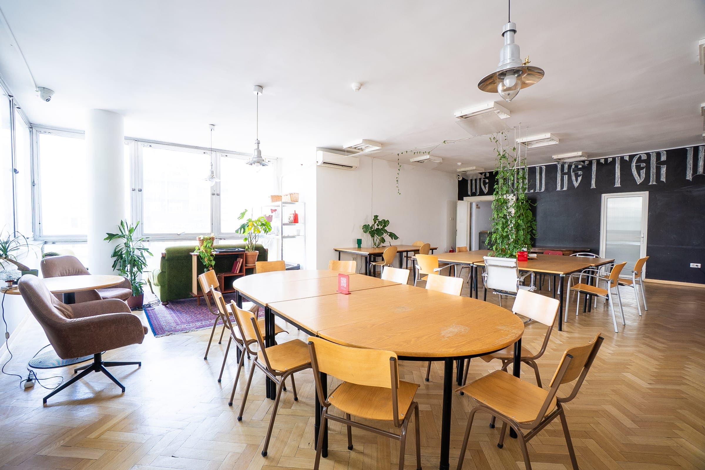 Social Room at SENSE—S.SPACE with lounge seating and communal tables for hire